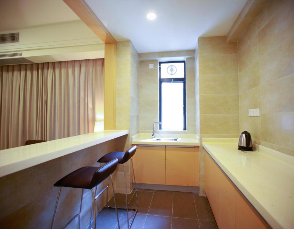 Xcellent International Serviced Apartment Guangzhou Kamer foto
